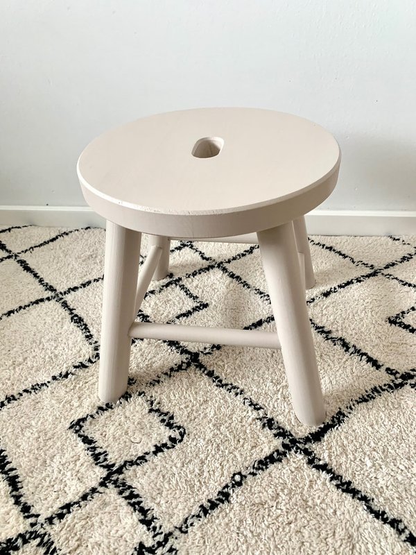 Small beige wooden stool